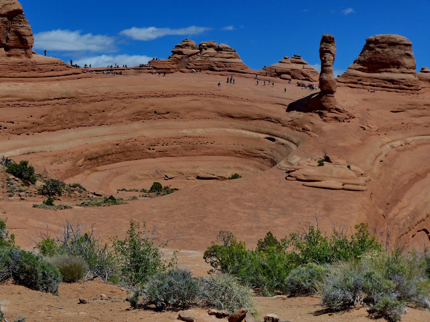 The bowl with Delicate Arch from the side (top right with shadow)